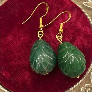 Green carved Jadeite earrings on .925 gold hooks